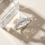White gold Pear Cut Diamond Prong Setting with Side Stones on a Pave Band_19
