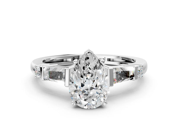 White gold Pear Cut Diamond Ring with Baguette Side Stones, Channel Set Band, and Four-Prong Setting