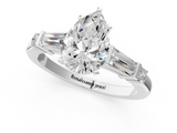 White gold Pear Cut Diamond Ring with Baguette Side Stones, Channel Set Band, and Four-Prong Setting_24
