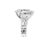 White gold Pear Cut Diamond Ring with Baguette Side Stones, Channel Set Band, and Four-Prong Setting_28