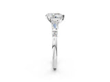 White gold Pear Cut Diamond Ring with Baguette Side Stones, Channel Set Band, and Four-Prong Setting_47