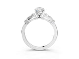 White gold Pear Cut Diamond Ring with Baguette Side Stones, Channel Set Band, and Four-Prong Setting_48