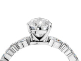 White gold Pear Cut Diamond Ring with Marquise and Round  Side Stones and Four-Prong Setting_140