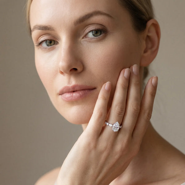 10K White Gold 2.02 Carat F VS1 Pear Diamond Ring with Marquise and Round Side Stones and Four-Prong Setting