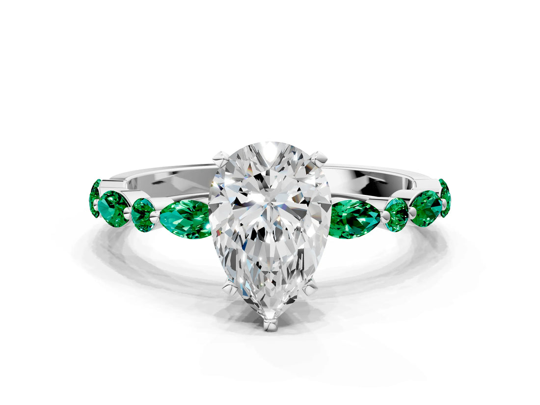 White gold Pear Cut Diamond Ring with Marquise and Round with Emerald side stone Side Stones and Four-Prong Setting_48