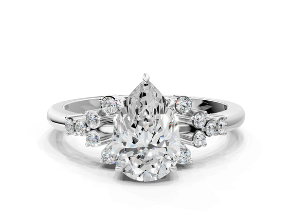 Platinum Pear Cut Diamond Ring with Side Stones and Four-Prong Setting