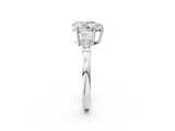 White gold Pear Cut Diamond Ring with Tapered Baguette Side Stones in Four-Prong Setting_34
