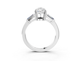 White gold Pear Cut Diamond Ring with Tapered Baguette Side Stones in Four-Prong Setting_35