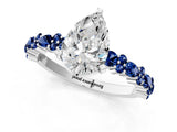 White gold Pear Cut Diamond Side Stone Solitaire Ring with Round with Blue Sapphire side stone and Four-Prong Setting_1