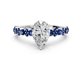 White gold Pear Cut Diamond Side Stone Solitaire Ring with Round with Blue Sapphire side stone and Four-Prong Setting