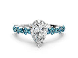White gold Pear Cut Diamond Side Stone Solitaire Ring with Round with Blue Topaz side stone and Four-Prong Setting