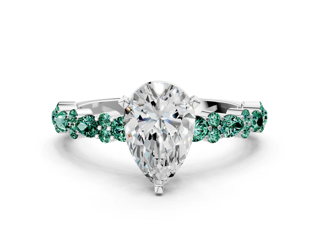 White gold Pear Cut Diamond Side Stone Solitaire Ring with Round with Green Sapphire side stone and Four-Prong Setting