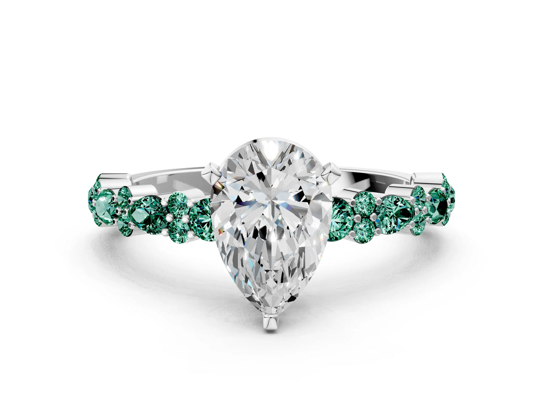 White gold Pear Cut Diamond Side Stone Solitaire Ring with Round with Green Sapphire side stone and Four-Prong Setting