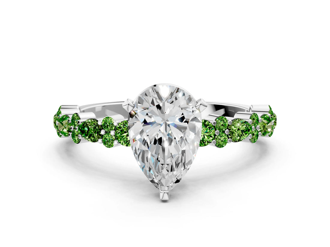 White gold Pear Cut Diamond Side Stone Solitaire Ring with Round with Peridot side stone and Four-Prong Setting