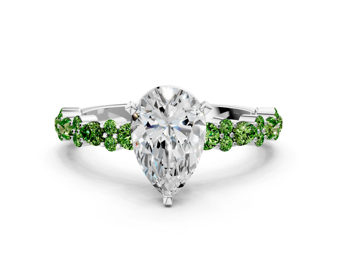 White gold Pear Cut Diamond Side Stone Solitaire Ring with Round with Peridot side stone and Four-Prong Setting