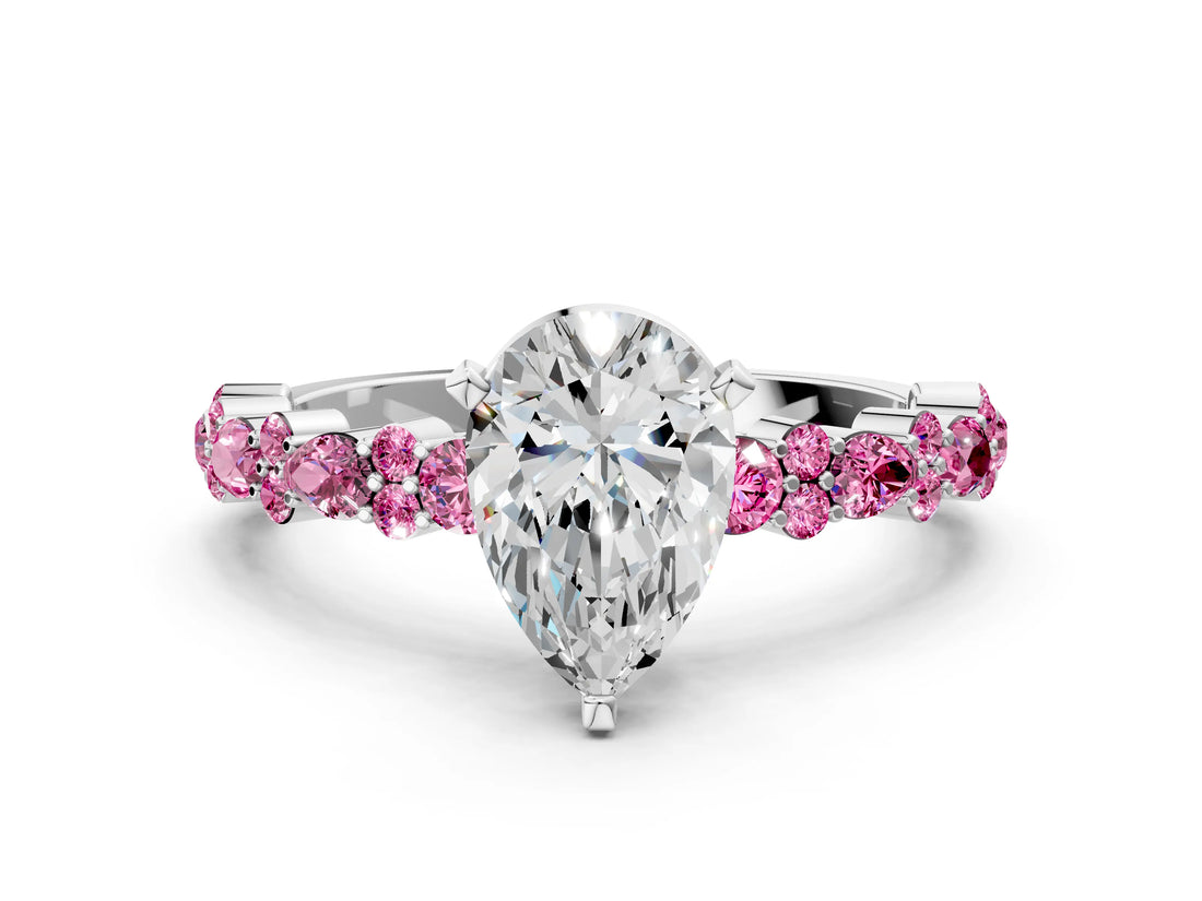 White gold Pear Cut Diamond Side Stone Solitaire Ring with Round with Pink Sapphire side stone and Four-Prong Setting