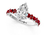White gold Pear Cut Diamond Side Stone Solitaire Ring with Round with Ruby side stone and Four-Prong Setting_1