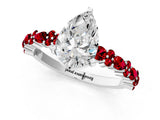 White gold Pear Cut Diamond Side Stone Solitaire Ring with Round with Ruby side stone and Four-Prong Setting_1