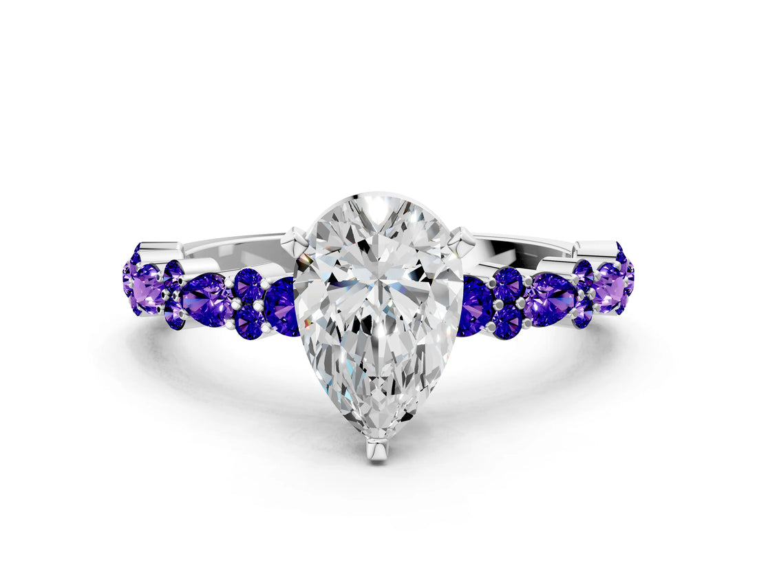 White gold Pear Cut Diamond Side Stone Solitaire Ring with Round with Tanzanite side stone and Four-Prong Setting