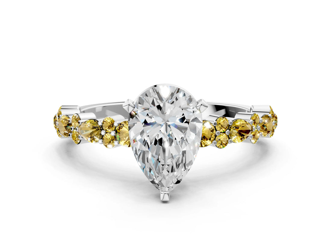White gold Pear Cut Diamond Side Stone Solitaire Ring with Round with Yellow Sapphire side stone and Four-Prong Setting