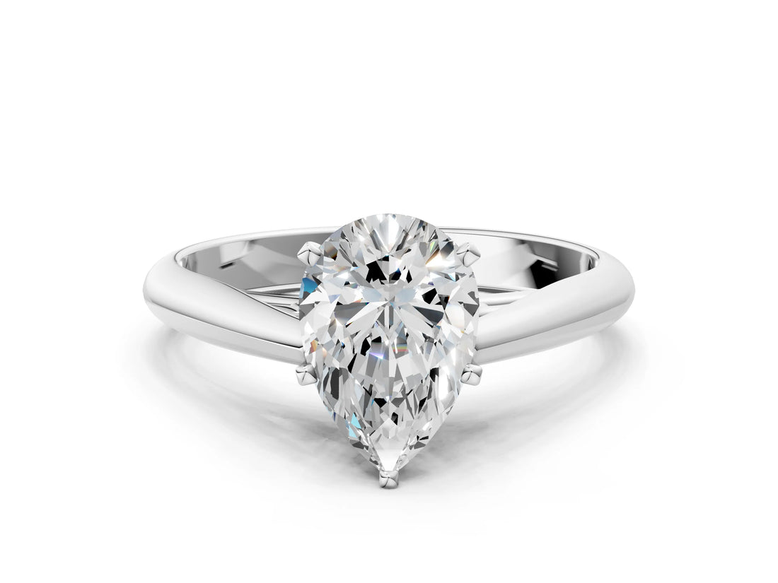 White gold Pear Cut Diamond Solitaire Engagement Ring with Cathedral Setting and Four-Prong Mount_292