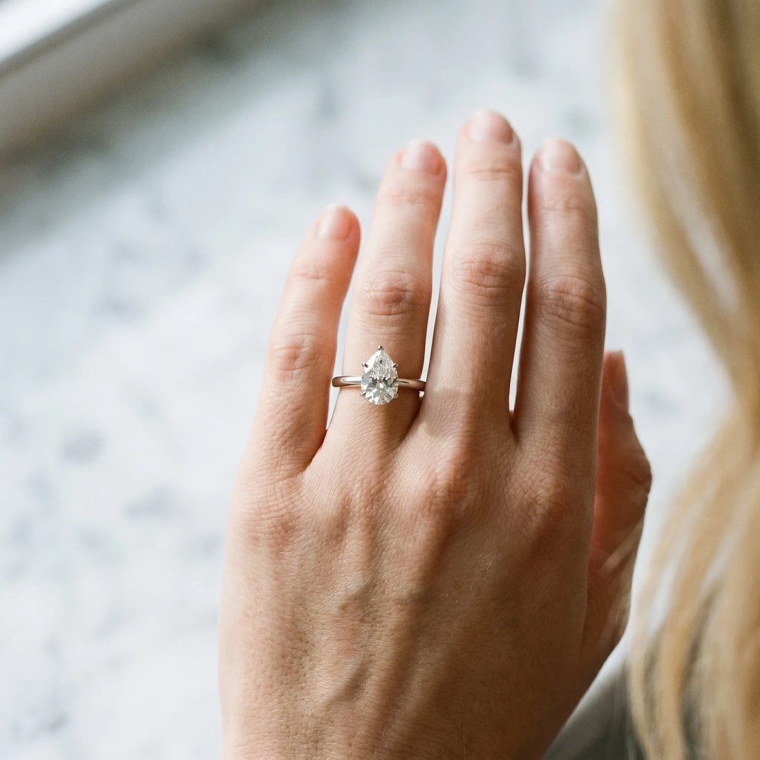 White gold Pear Cut Diamond Solitaire Engagement Ring with Classic Band and Four-Prong Setting_188