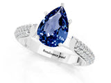 White gold Pear Cut Diamond Solitaire Engagement Ring with Pavé Band and Four-Prong Setting_1