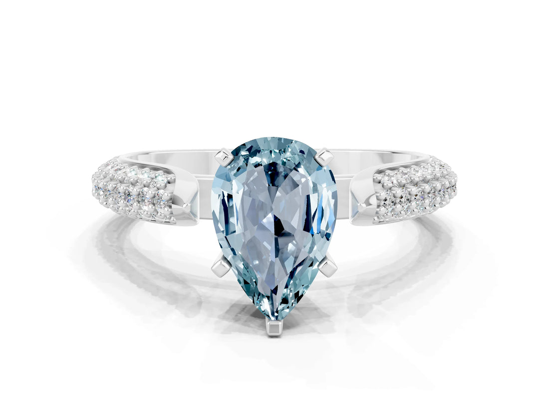 White gold Pear Cut Diamond Solitaire Engagement Ring with Pavé Band and Four-Prong Setting