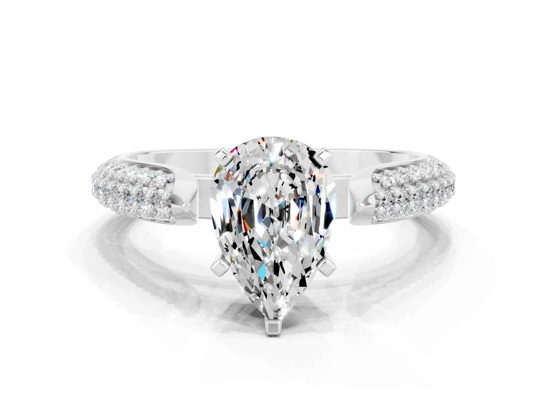 White gold Pear Cut Diamond Solitaire Engagement Ring with Pavé Band and Four-Prong Setting
