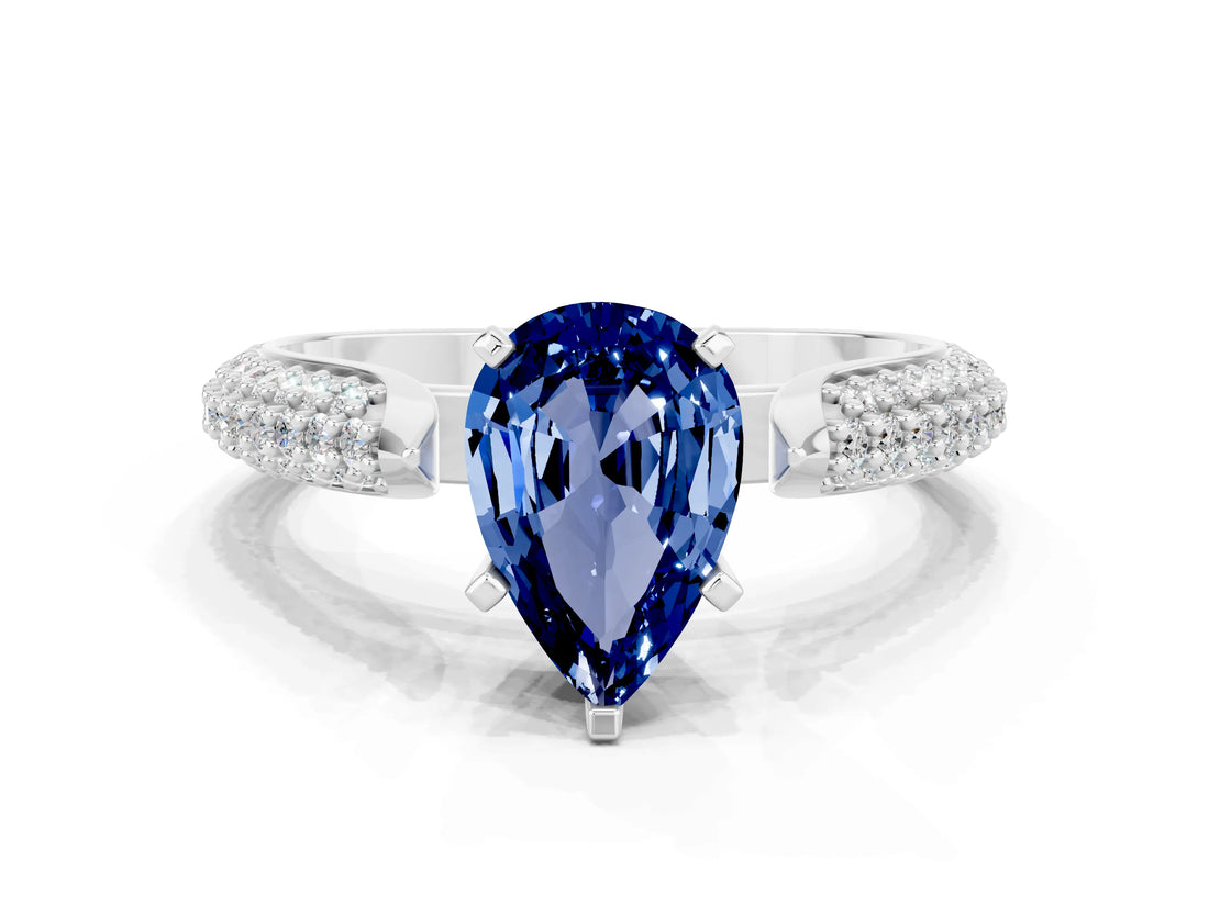 White gold Pear Cut Diamond Solitaire Engagement Ring with Pavé Band and Four-Prong Setting