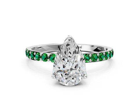 White gold Pear Cut Diamond Solitaire Engagement Ring with Round with Emerald side stone Pavé Band and Prong Setting_24