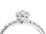 White gold Pear Cut Diamond Solitaire Pavé Engagement Ring with Round Band and Prong Setting_18