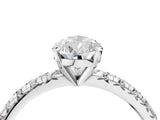 White gold Pear Cut Diamond Solitaire Pavé Engagement Ring with Round Band and Prong Setting_60