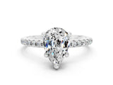 White gold Pear Cut Diamond Solitaire Ring with Four-Prong Setting and Pavé Band