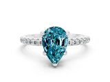 White gold Pear Cut Diamond Solitaire Ring with Four-Prong Setting and Pavé Band