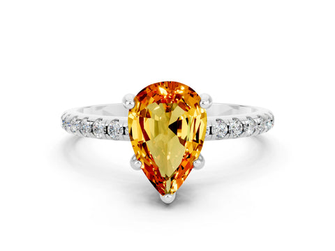 White gold Pear Cut Diamond Solitaire Ring with Four-Prong Setting and Pavé Band