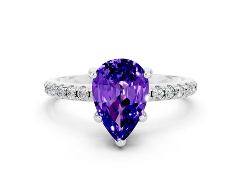 White gold Pear Cut Diamond Solitaire Ring with Four-Prong Setting and Pavé Band