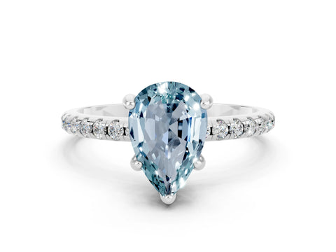 White gold Pear Cut Diamond Solitaire Ring with Four-Prong Setting and Pavé Band