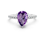 White gold Pear Cut Diamond Solitaire Ring with Four-Prong Setting and Pavé Band