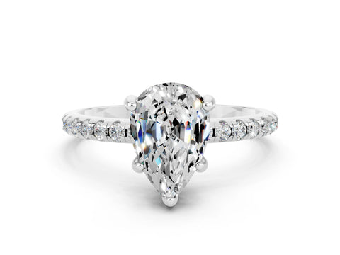 White gold Pear Cut Diamond Solitaire Ring with Four-Prong Setting and Pavé Band