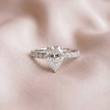 White gold Pear Cut Diamond Solitaire Ring with Pavé Accents and Four-Prong Setting_83