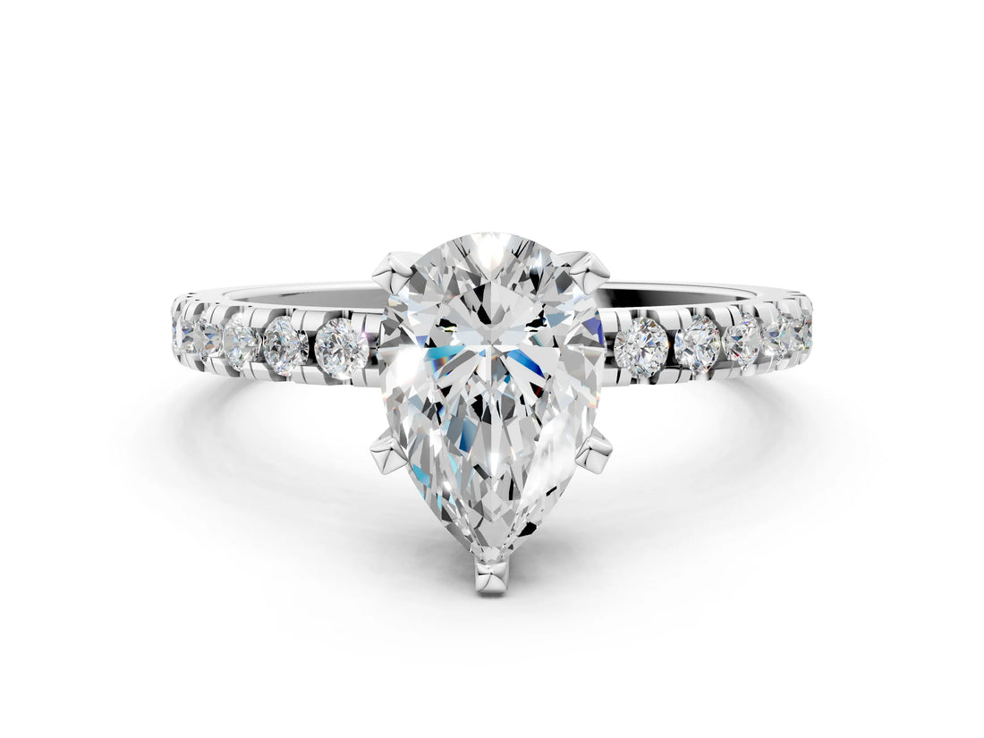 White gold Pear Cut Diamond Solitaire Ring with Pavé Band and Four-Prong Setting_317