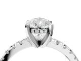 White gold Pear Cut Diamond Solitaire Ring with Pavé Band and Four-Prong Setting_321