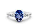 White gold Pear Cut Diamond Solitaire Ring with Pavé Band and Prong Setting