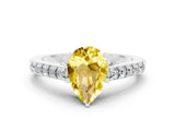 White gold Pear Cut Diamond Solitaire Ring with Pavé Band and Prong Setting