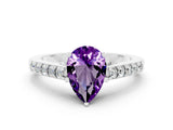 White gold Pear Cut Diamond Solitaire Ring with Pavé Band and Prong Setting