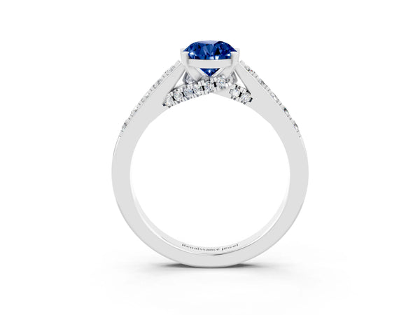White gold Pear Cut Blue Sapphire Solitaire Ring with Crossover Gallery and Round  Pavé Band
