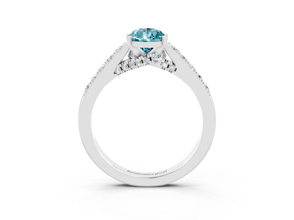 Platinum Pear Cut Blue Topaz Solitaire Ring with Crossover Gallery and Round  Pavé Band