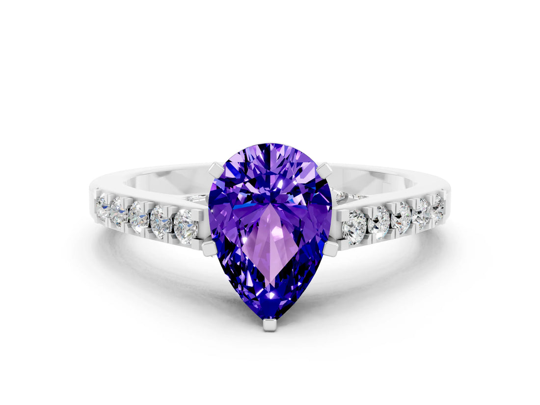 White gold Pear Cut Diamond Solitaire Ring with Pavé Band and Prong Setting