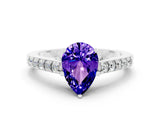 White gold Pear Cut Diamond Solitaire Ring with Pavé Band and Prong Setting